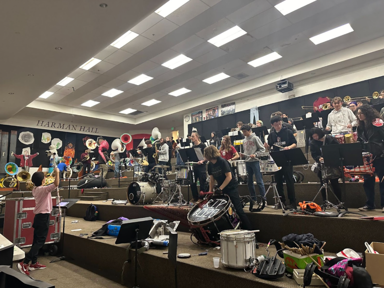 Stella Chung conducts the Marching Band at a band practice. (Photo: Grace Zhao/THE STANFORD DAILY)